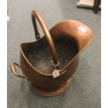 An old copper coal bucket.