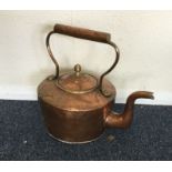 A large copper kettle.