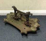 A cast iron boot scrape.