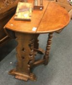 A good oak drop leaf table.