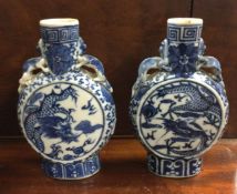 A good pair of blue and white Chinese vases.