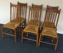 A set of six pine spindle back chairs.
