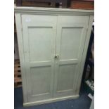 A painted pine two door cupboard.