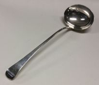 A George III silver soup ladle. London 1801. By Ch