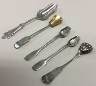 Five Continental silver salt spoons and scoops; Du
