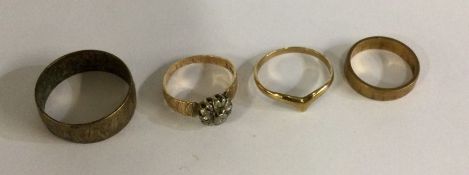 A group of four 9 carat rings. Approx. 10 grams. E