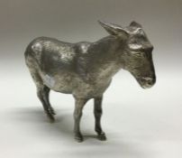 A large silver figure of a donkey. London 1964. Ap