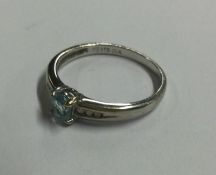 A 9 carat blue tourmaline and diamond ring. Approx