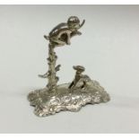 A good cast table toy depicting a child playing wi