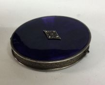 A silver and enamel hinged top box with central pl