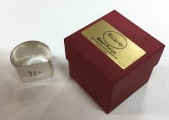 BRIAN FULLER: A cased silver napkin ring in origin