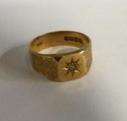 An 18 carat gold diamond signet ring. Approx. 8 gr
