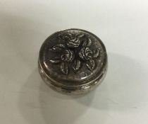 A chased silver box with lift-off lid. Approx. 16