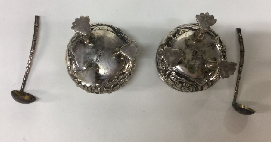 WANG HING: A pair of Chinese silver salts chased w - Image 2 of 3