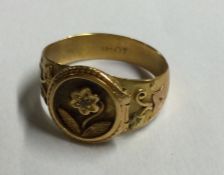 An Antique diamond mounted signet ring with hinged