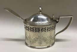A fine Victorian pierced silver mustard pot with e