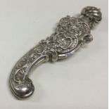 A silver chased scent bottle. Birmingham circa 191