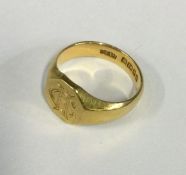 An 18 carat gold signet ring. Approx. 9 grams. Est