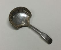 A George II silver caddy spoon. Birmingham 1816. B