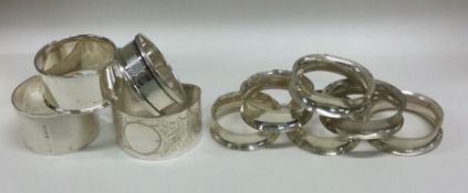 A good collection of heavy silver napkin rings. Va