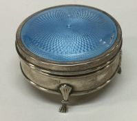 A silver and enamel hinged top box. Birmingham 191