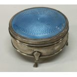 A silver and enamel hinged top box. Birmingham 191