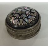 A heavy silver and MOP box with hinged top. Approx