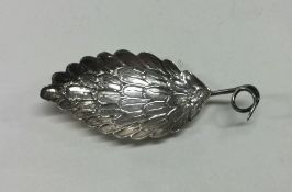 A 19th Century silver caddy spoon with feathered w