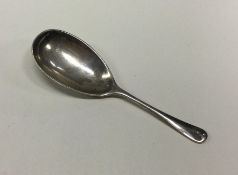 A silver caddy spoon. Sheffield 1918. By WS Savage