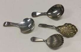 Four various Georgian silver caddy spoons to inclu