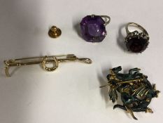 A group of silver mounted rings, brooches etc. Est