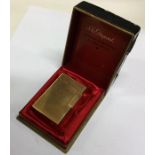 DUPONT: A good gold plated lighter in box. Est. £3