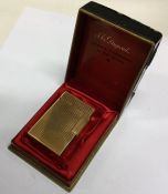DUPONT: A good gold plated lighter in box. Est. £3