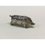 A fine and heavy silver pig with pull-off lid. Lon