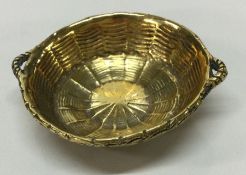 TIFFANY & CO: A rare novelty silver gilt basket we