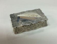 A decorative Victorian silver table snuff box. Lon
