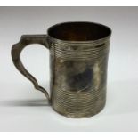 A heavy George III reeded silver mug. London 1803.