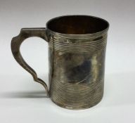 A heavy George III reeded silver mug. London 1803.