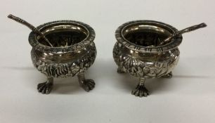WANG HING: A pair of Chinese silver salts chased w
