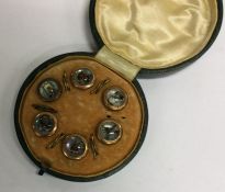 A good cased set of six buttons of Essex crystal s