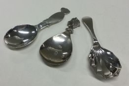 Three various 20th Century silver caddy spoons. Bi