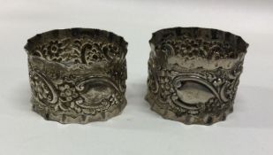A pair of chased silver napkin rings. Birmingham 1