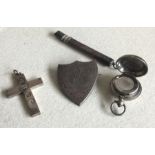 A good silver shield together with a cross etc. Ap