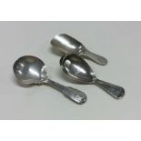 Three Georgian silver caddy spoons. Various dates
