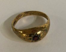 A 9 carat garnet single stone ring. Approx. 4 gram