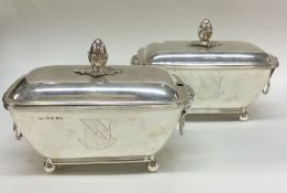 A fine pair of George III silver sauce tureens . L
