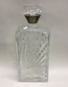 A large stylish silver mounted decanter of square