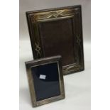 Two modern silver picture frames. Est. £20 - £30.