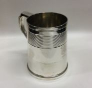 EXETER: A Victorian silver pint mug. 1881. By JW&C