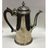 A George II silver coffee pot. Circa 1730. Approx.